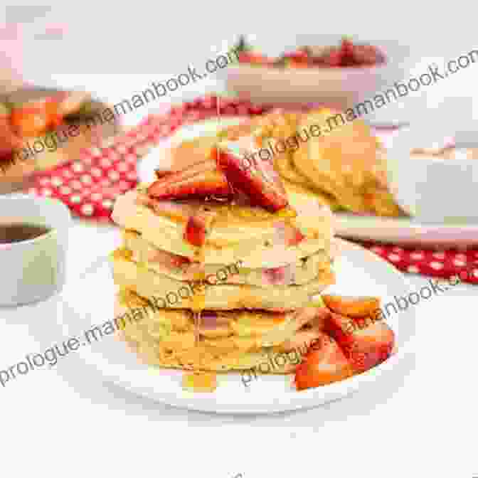 A Stack Of Fluffy Pancakes Topped With Fresh Strawberries And A Drizzle Of Maple Syrup The Easy Puerto Rican Cookbook: 100 Classic Recipes Made Simple