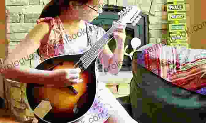 A Teacher Guiding A Child On How To Play The Mandolin Easiest Mandolin Tunes For Children